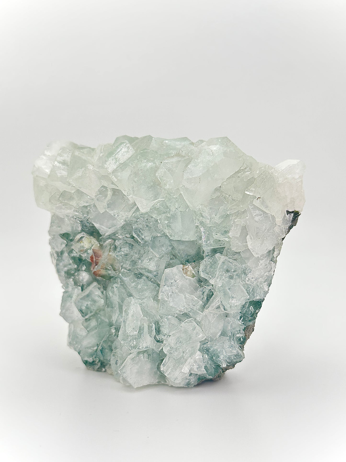 Green Apophyllite with Hematite